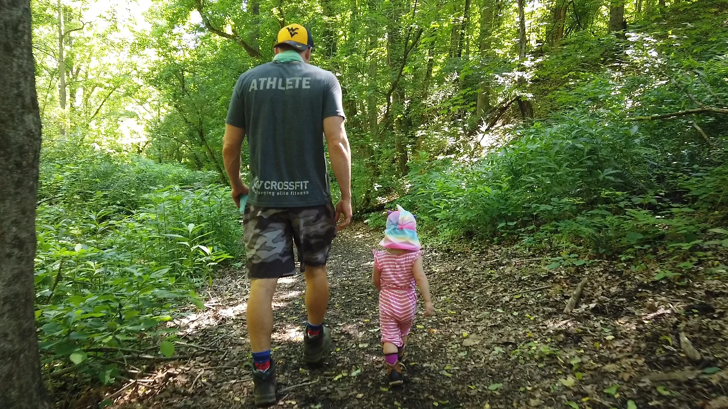 A father and his daughter enjoy the beautiful trails