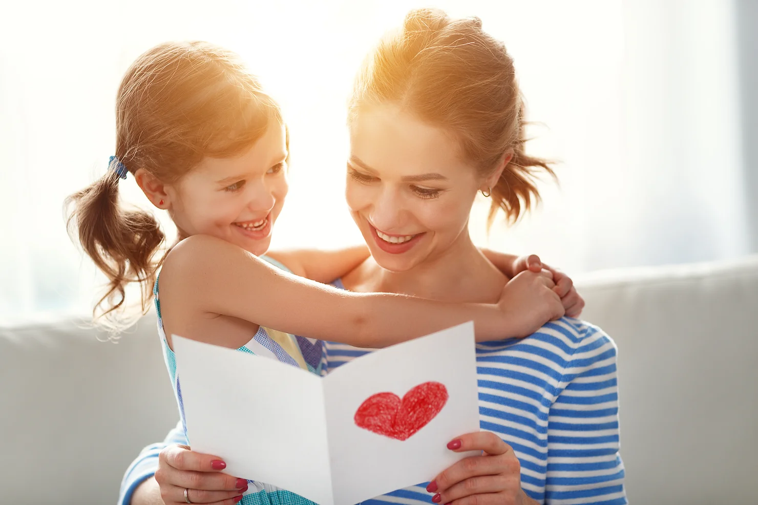 A daughter celebrates her mother on Mothers Day with a card full of love